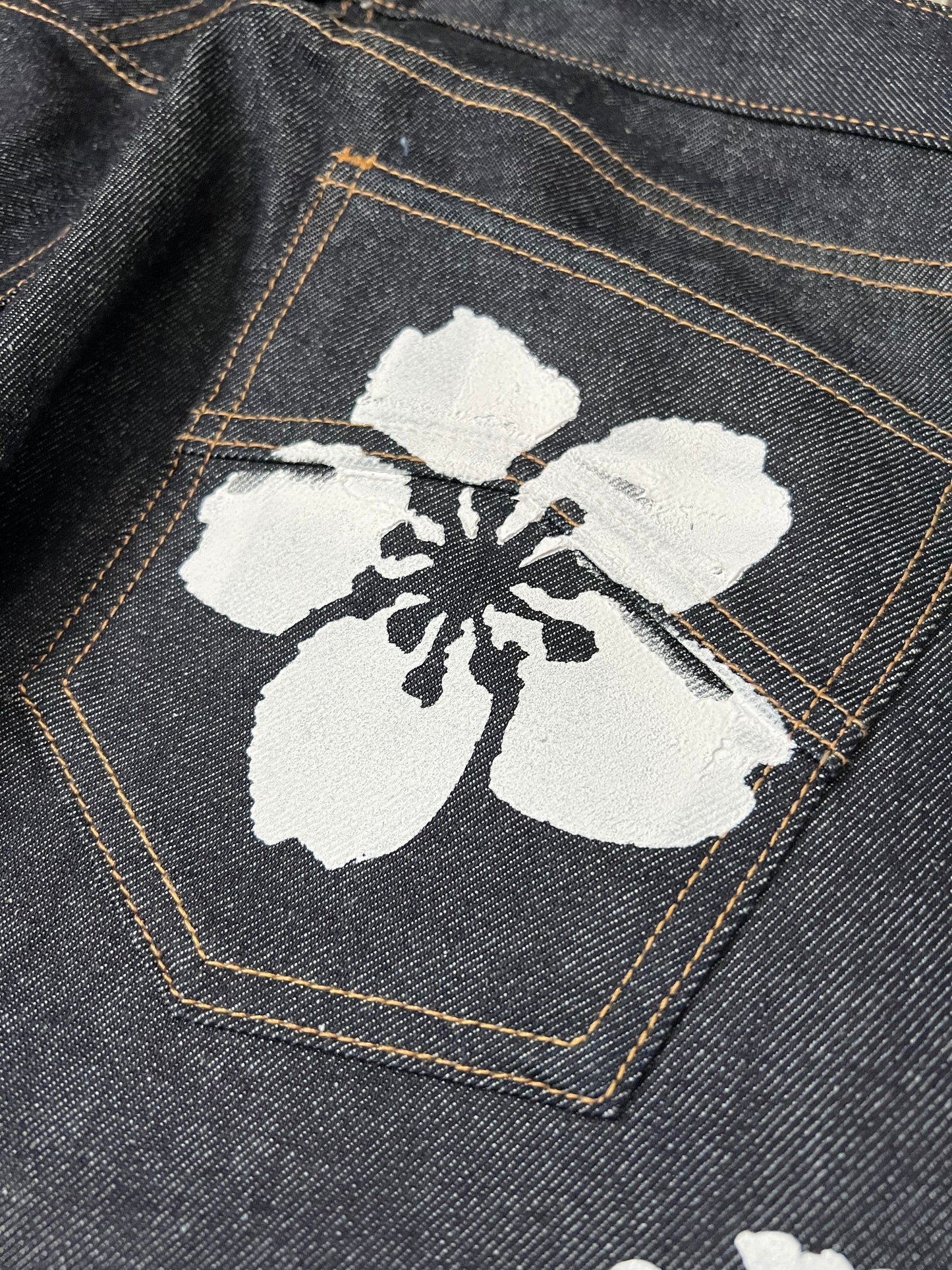 XHAIKARA FLOWER PRINTED RHUDE DENIM JEANS